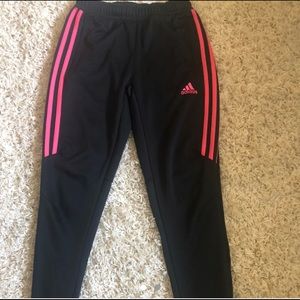 Hot pink adidas track pants half stripe